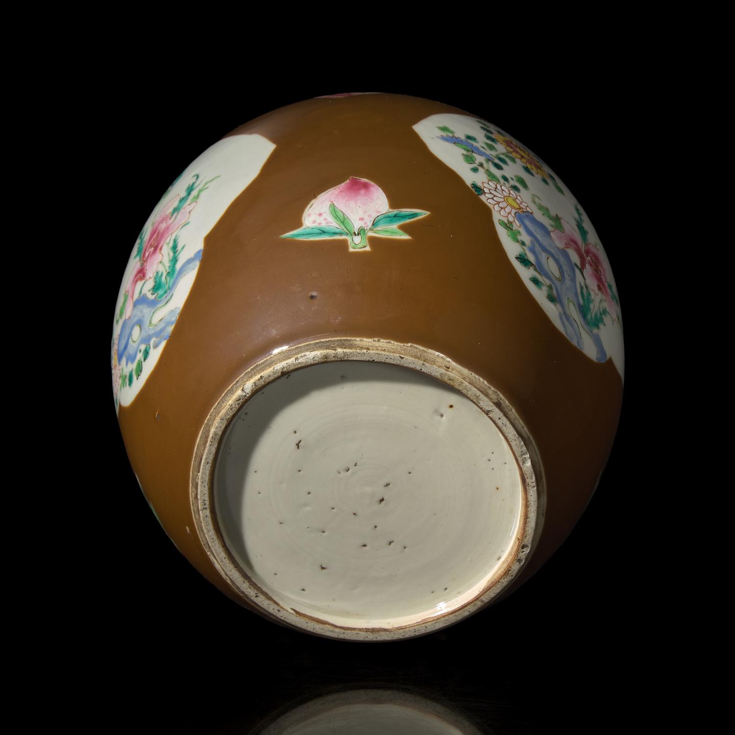 A Chinese Café-au-Lait Ground Famille Rose Jar, 18th Century — 清中期 烏金地開光粉彩花卉罐