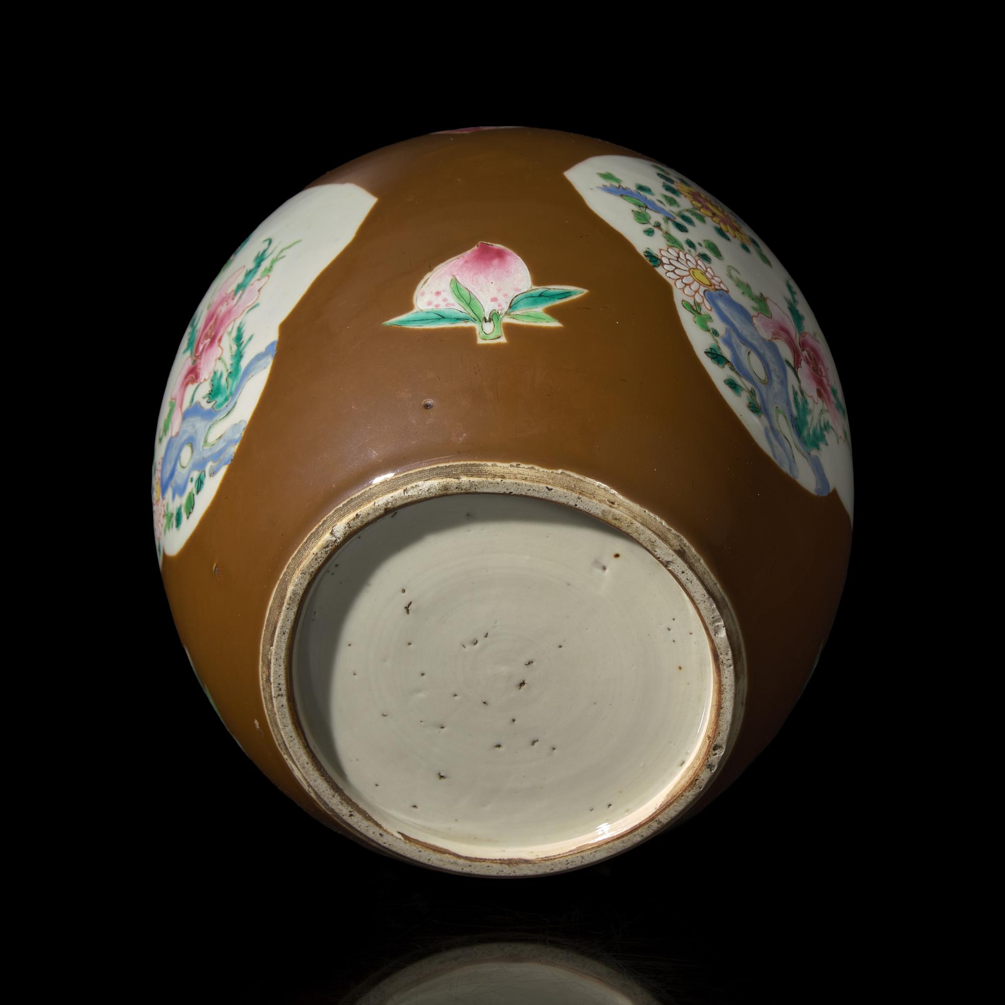 A Chinese Café-au-Lait Ground Famille Rose Jar, 18th Century — 清中期 烏金地開光粉彩花卉罐
