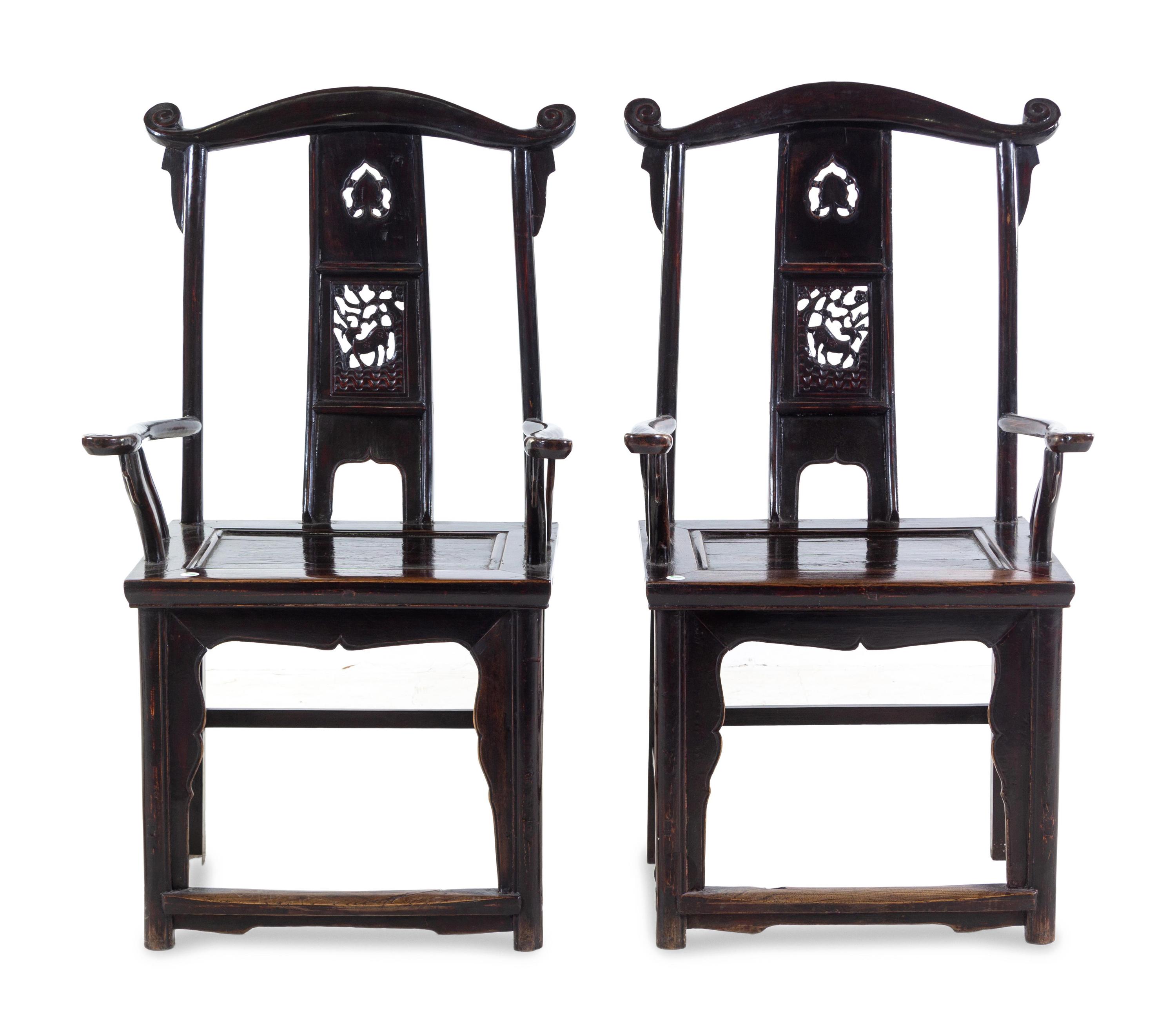 A Pair of Chinese Yoke-Back Hardwood Armchairs