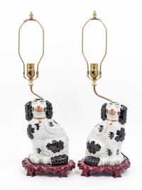 A Pair of Staffordshire Spaniels Height overall 26 inches.
