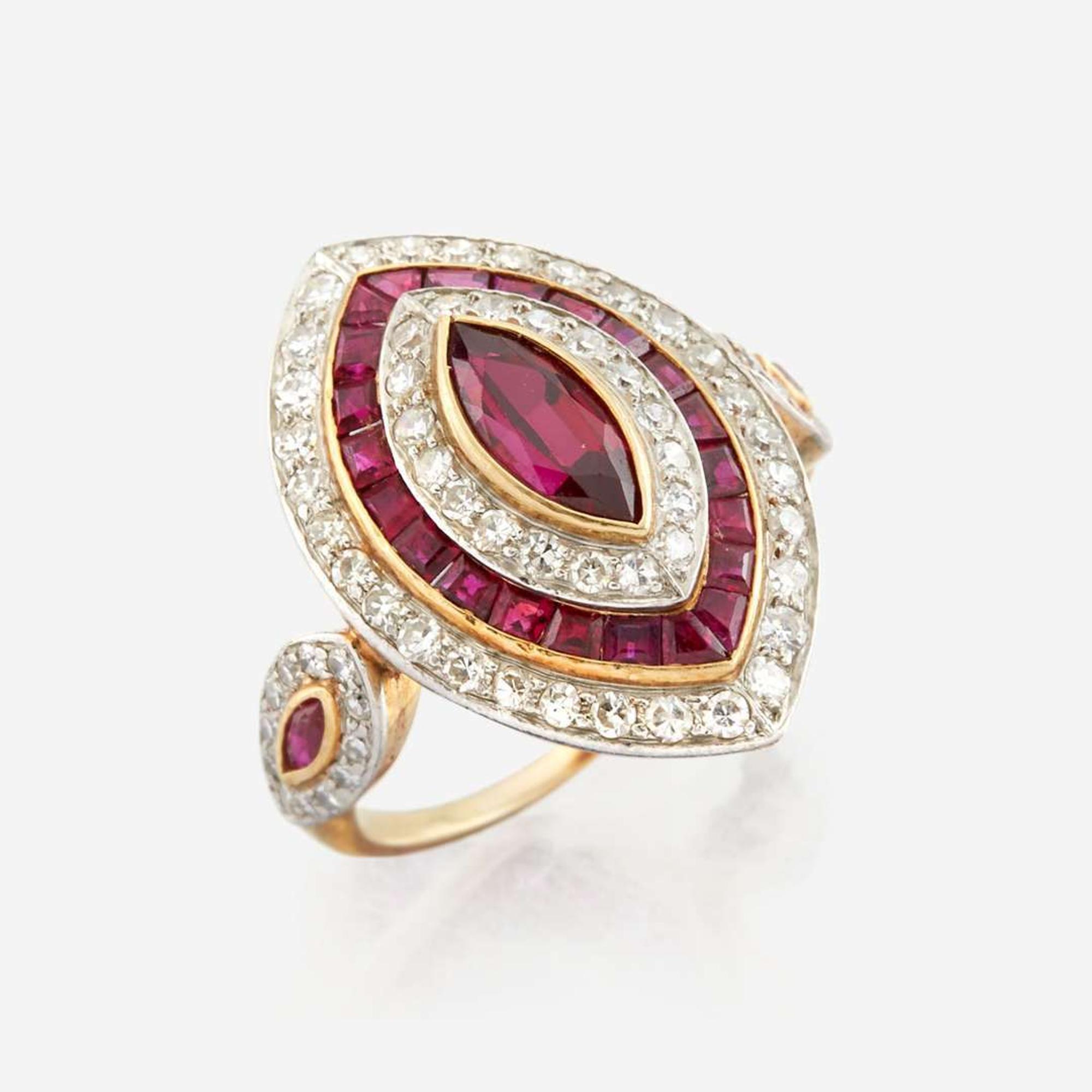 A ruby, diamond, and platinum topped gold ring