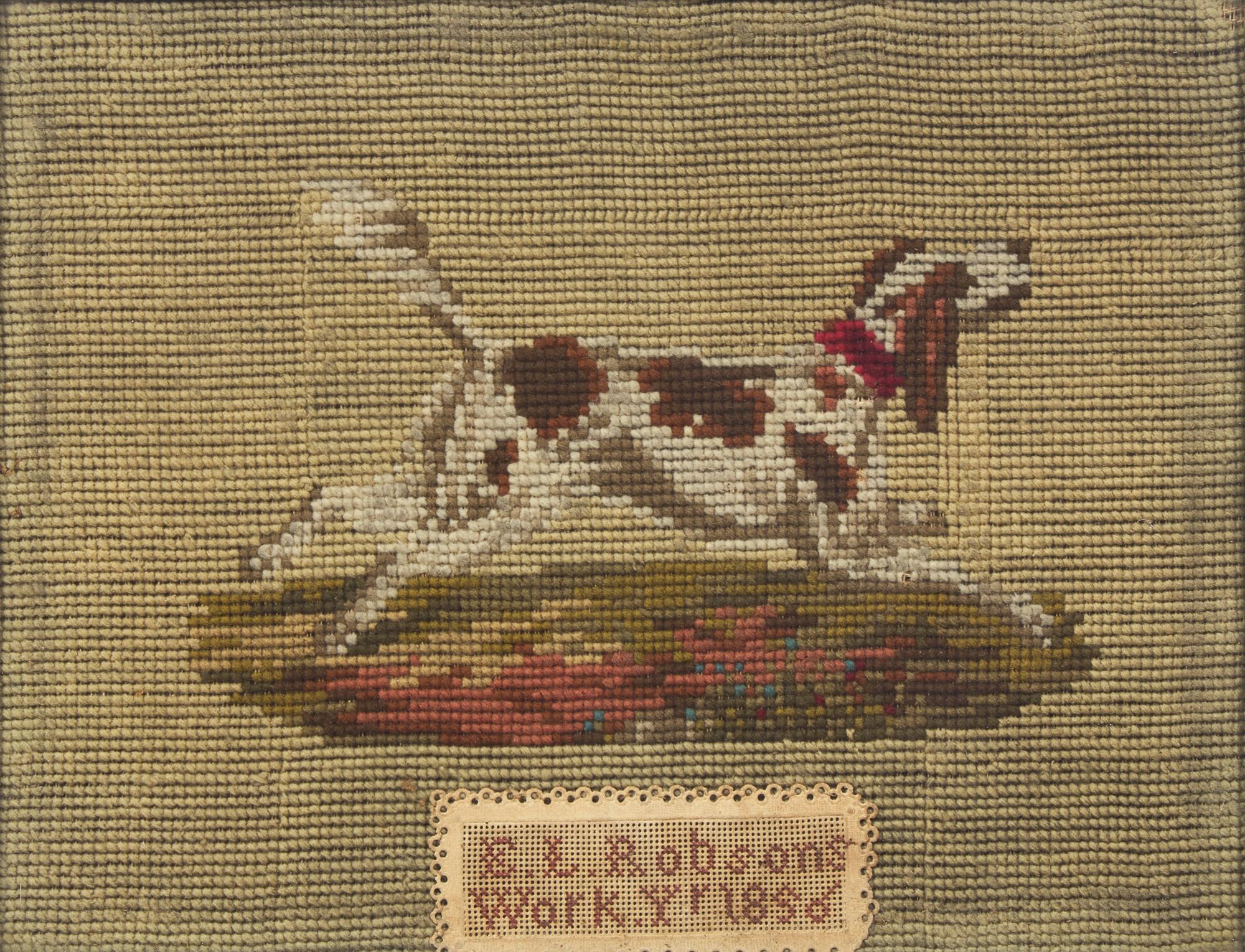A Needlework Sampler and a Needlepoint Picture of a Hound