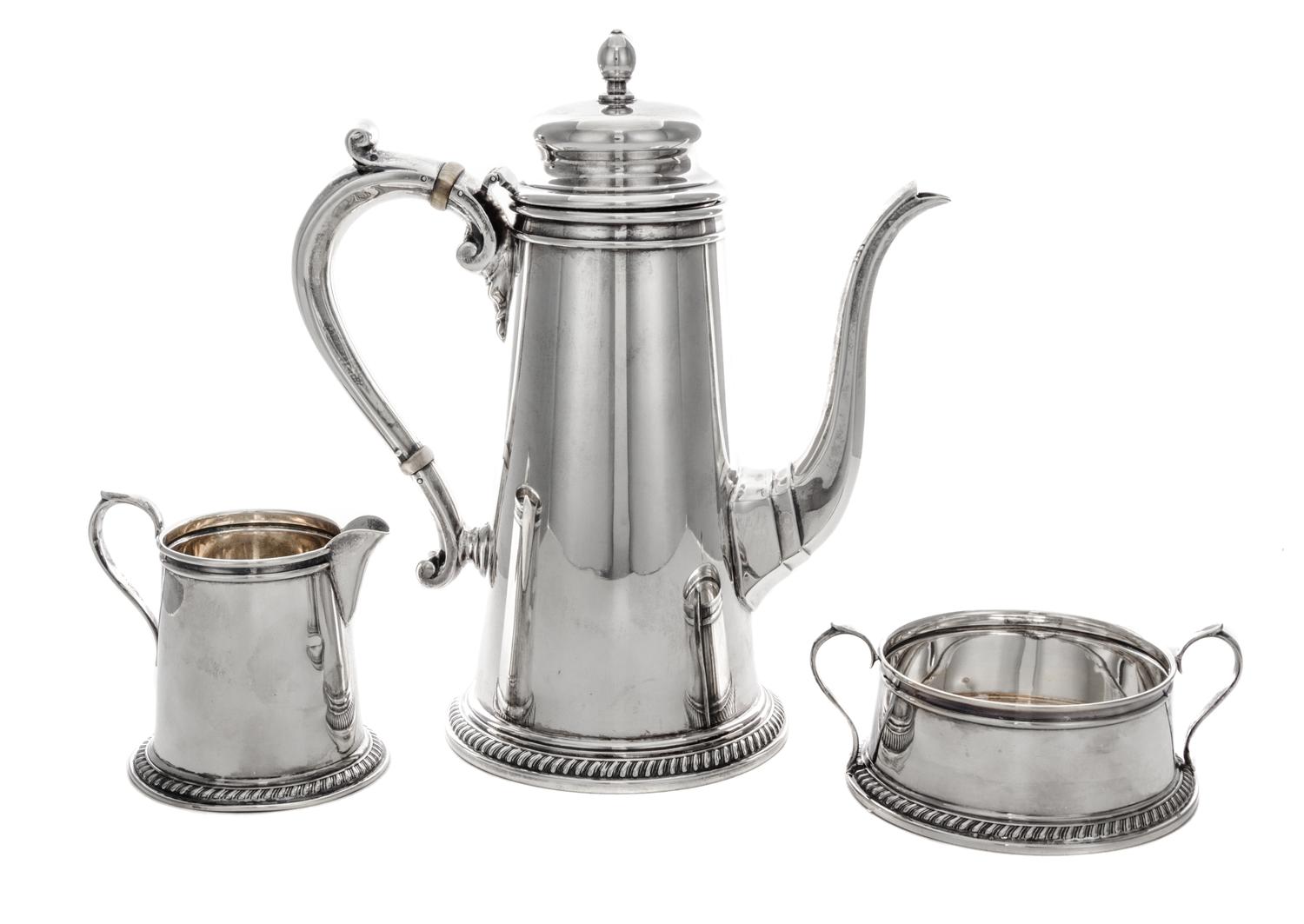 An American Silver Chocolate Set, Reed & Barton, Taunton, MA, 1939-1940, comprisng a chocolate pot, a milk pitcher and a sugar.