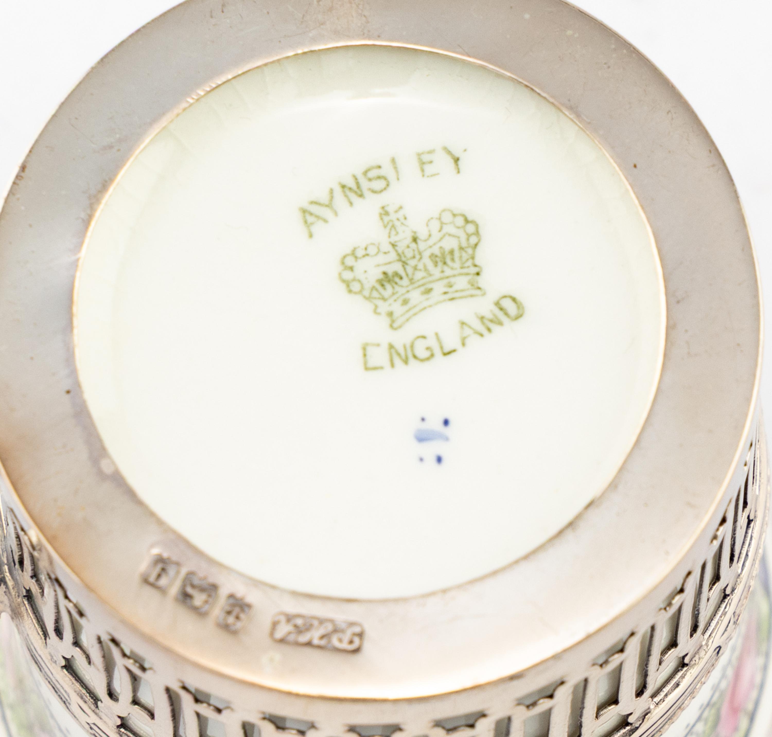 A Set of Six Aynsley Porcelain Coffee Cups and Saucers with Silver Liners