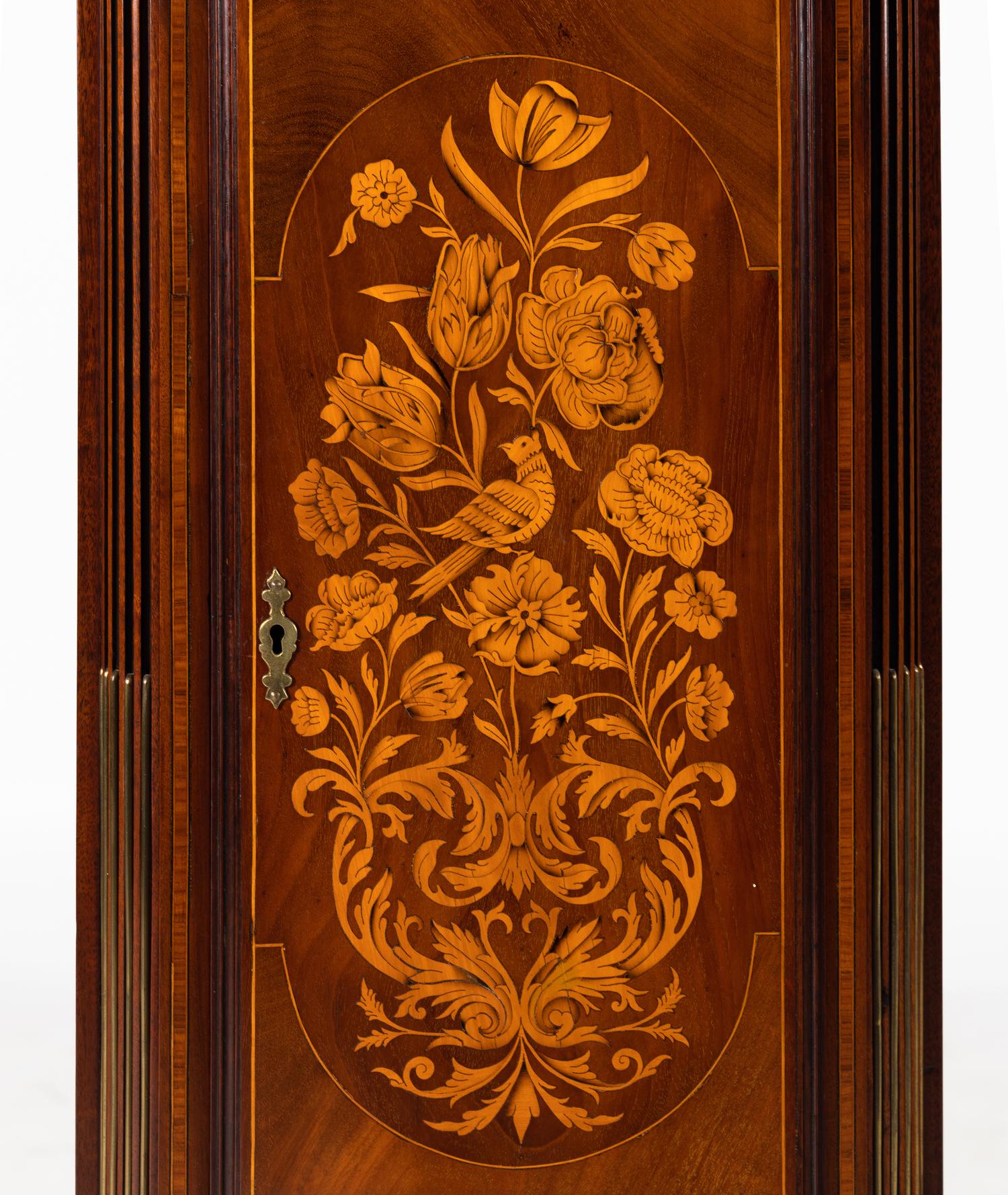 An Edwardian Mahogany and Marquetry Tall Case Clock
