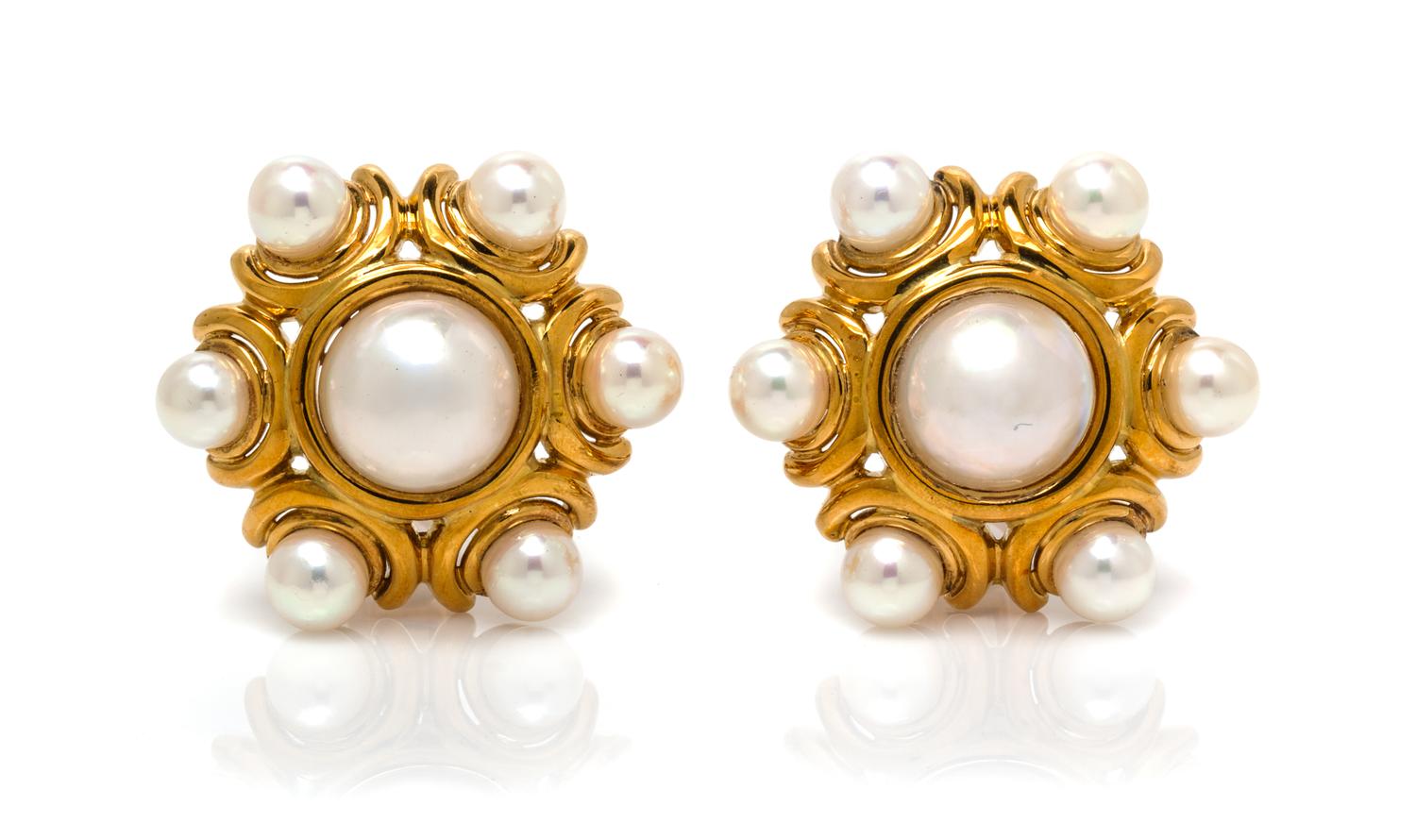 A Pair of 18 Karat Yellow Gold and Cultured Pearl Earclips, 23.30 dwts.