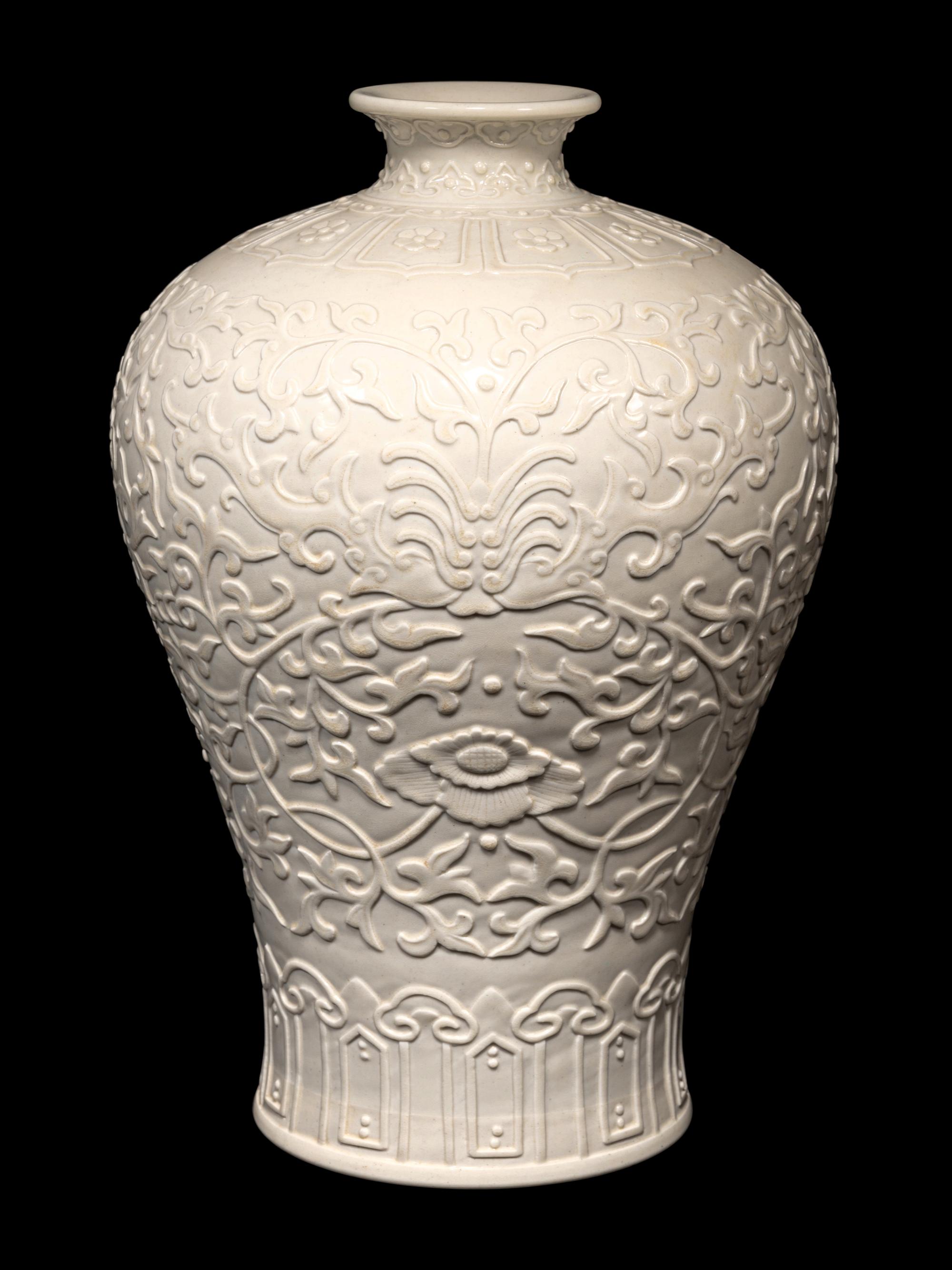 A Carved White Glazed Porcelain Meiping Vase