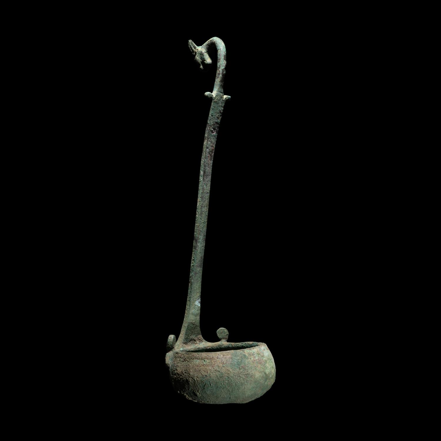 A Roman Bronze Ladle with Panther Handle