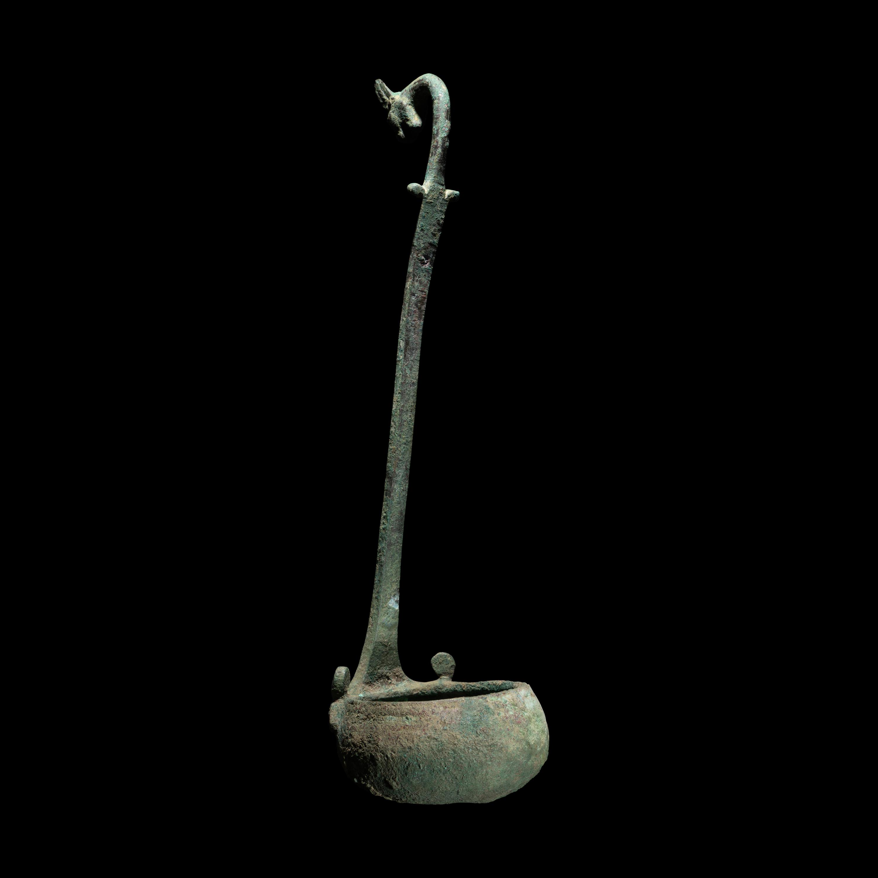 A Roman Bronze Ladle with Panther Handle