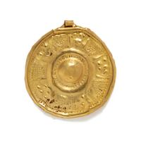 A Near Eastern Gold Disk Pendant