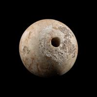 An Egyptian Limestone Mace Head