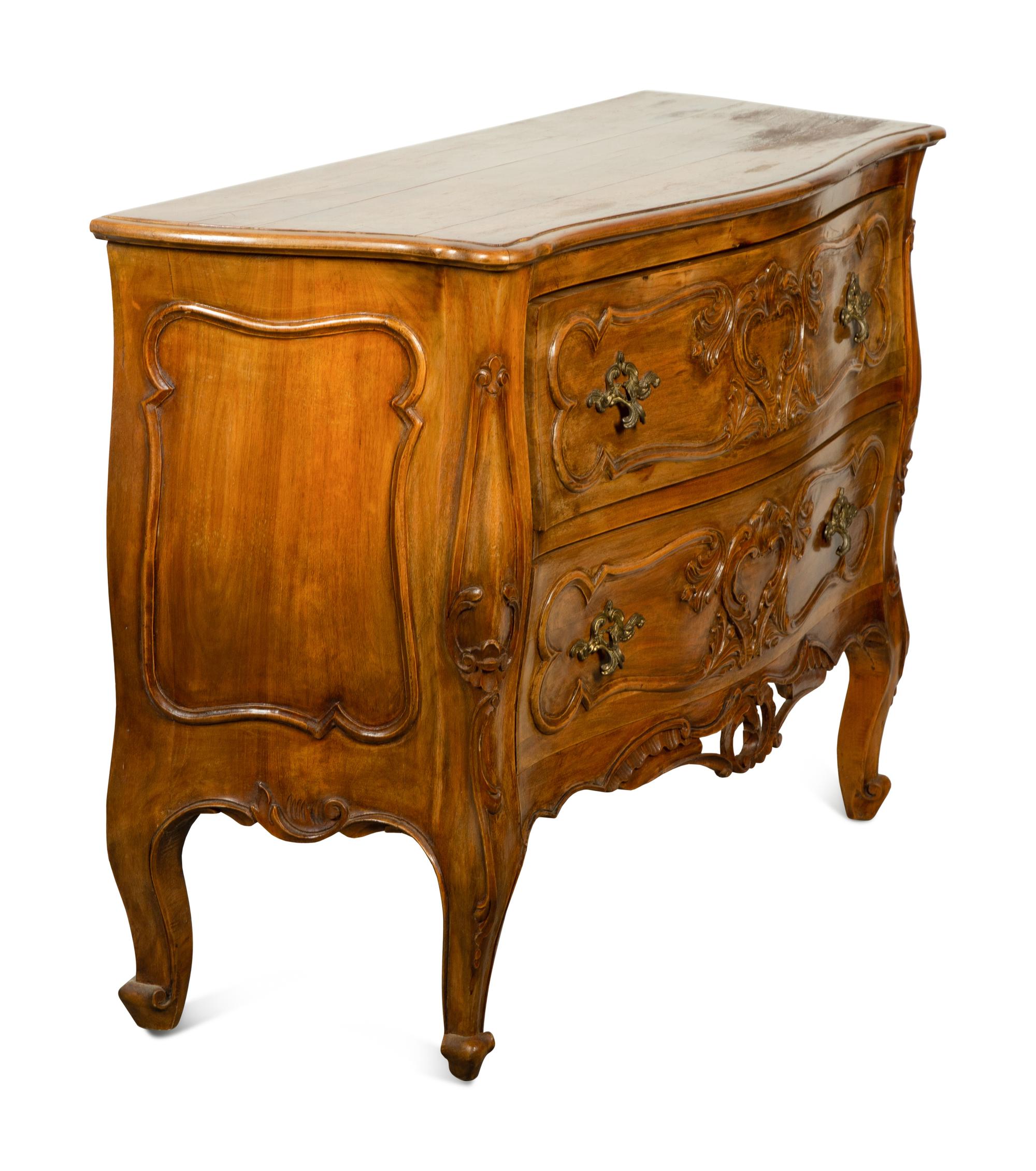 A Louis XV Provincial Style Walnut Commode
