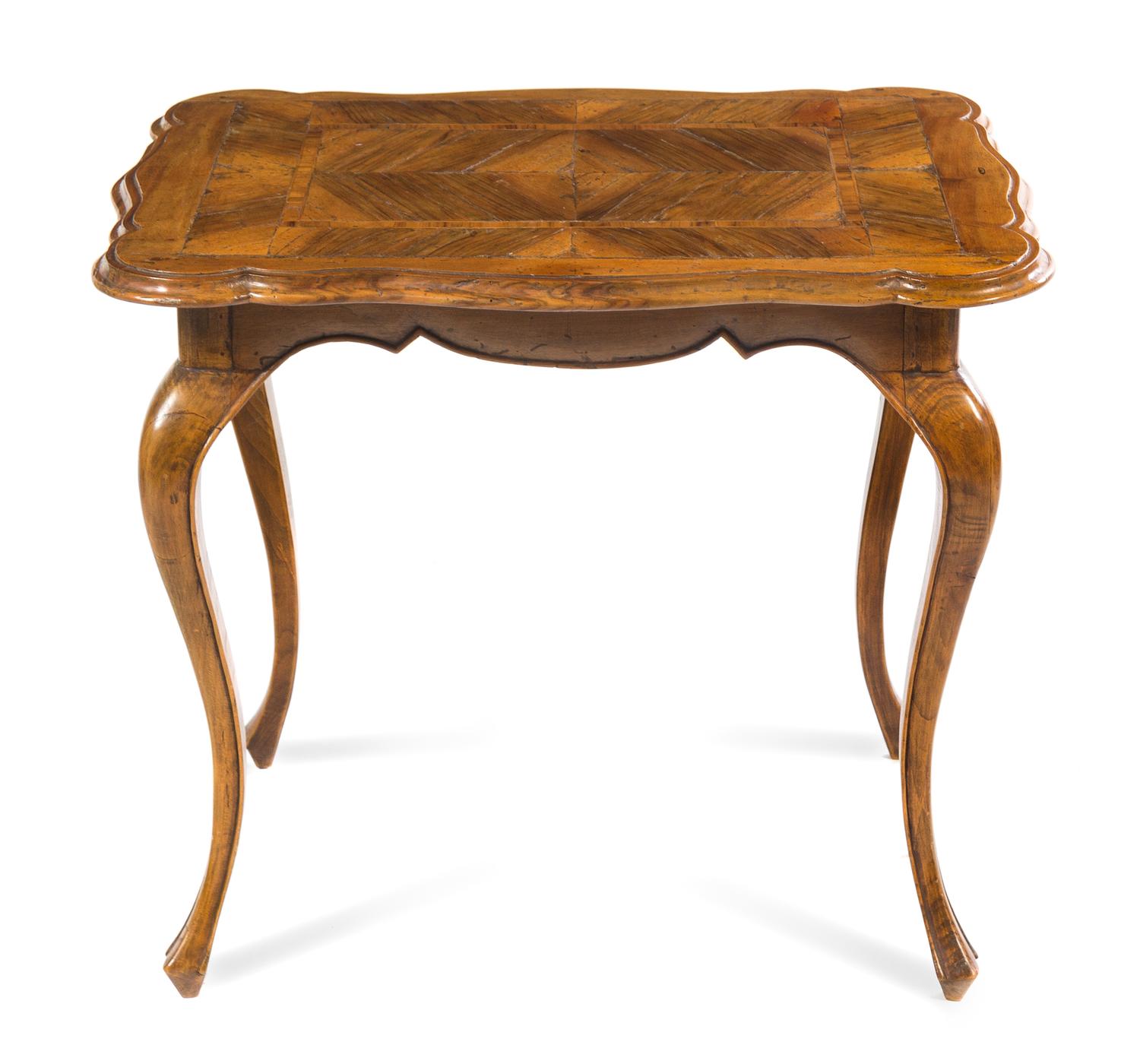 A Continental Parquetry Occasional Table. Height 26 1/4 x width 32 x depth 22 inches.