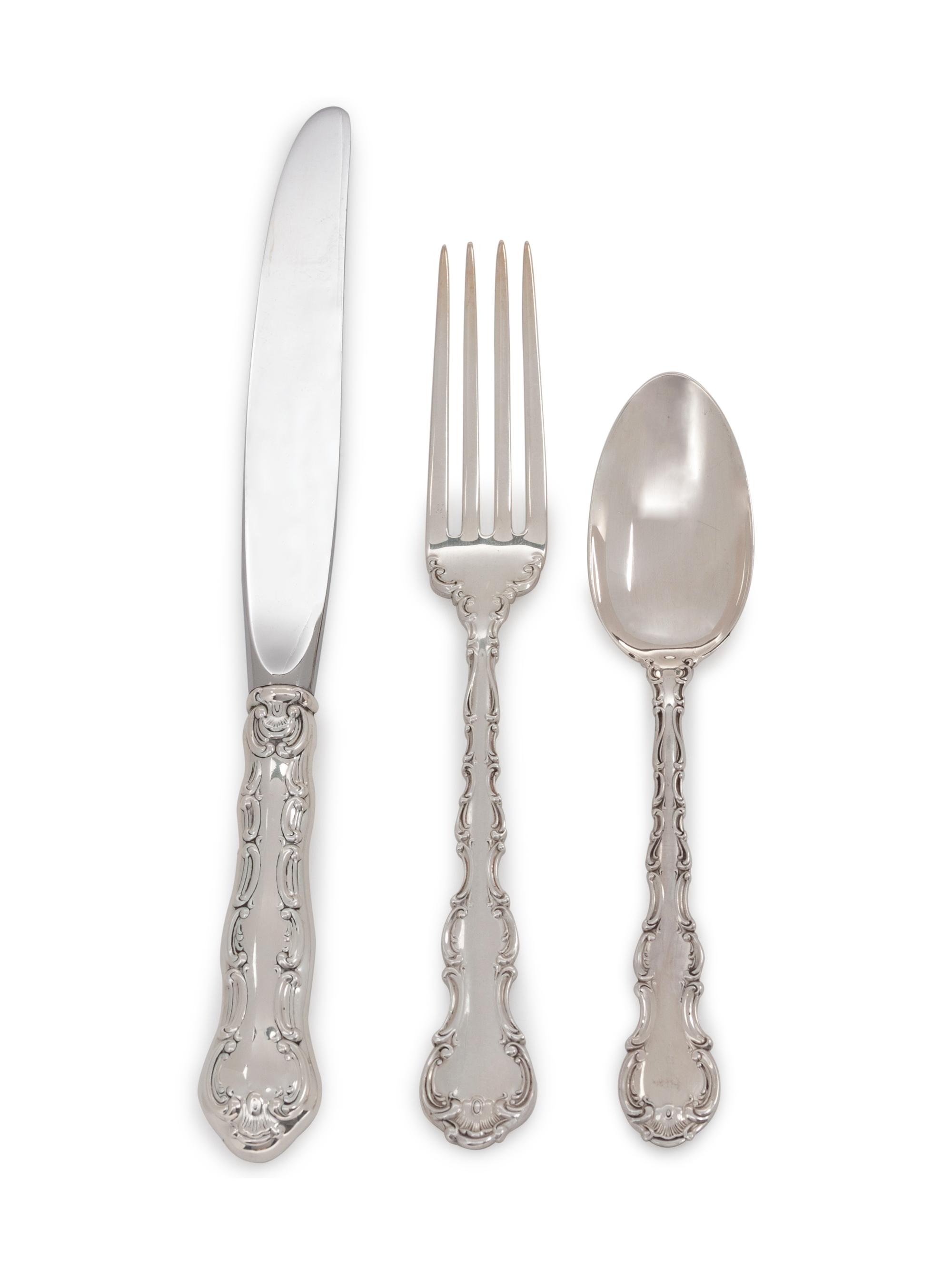 Strasbourg pattern, comprising: 6 dinner knives with stainless steel blades 6 luncheon knives with stainless steel blades 6 dinner forks 13 luncheon forks 10 salad forks 22 teaspoons 6 soup cream spoons 6 butter spreaders with stainless steel blades 5 butter spreaders 6 cocktail forks 1 carving set 14 serving utensils 2 salt spoons 104 pieces total.