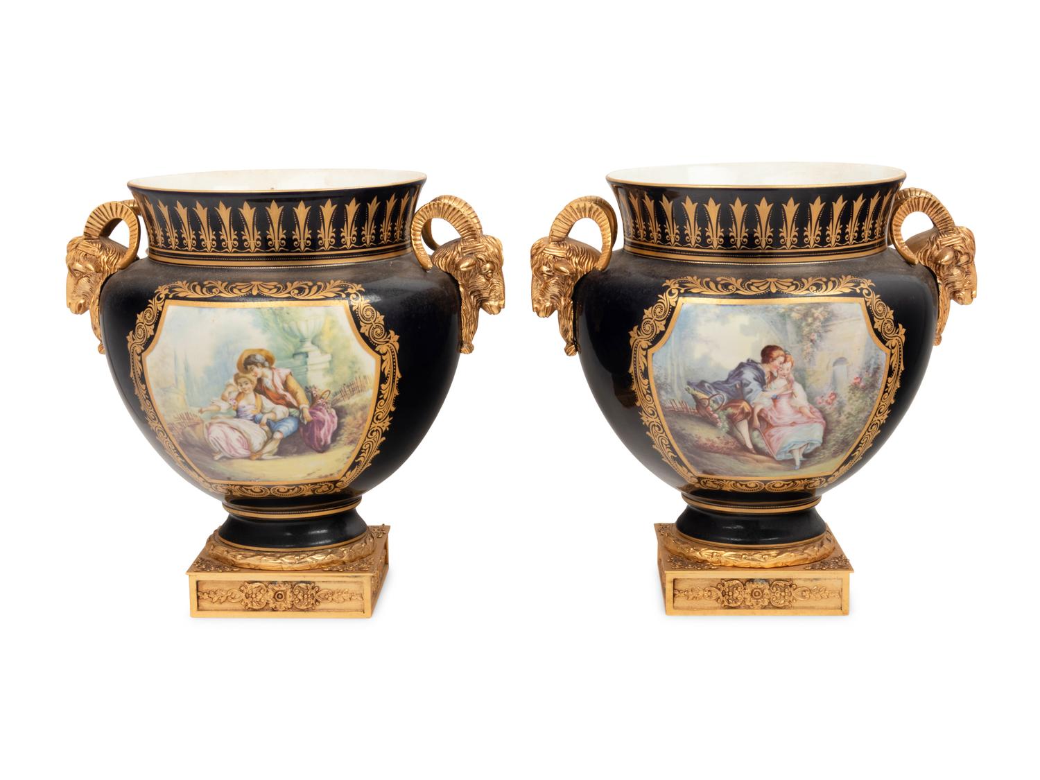 A Pair of Sèvres Style Gilt Bronze Mounted Porcelain Vases