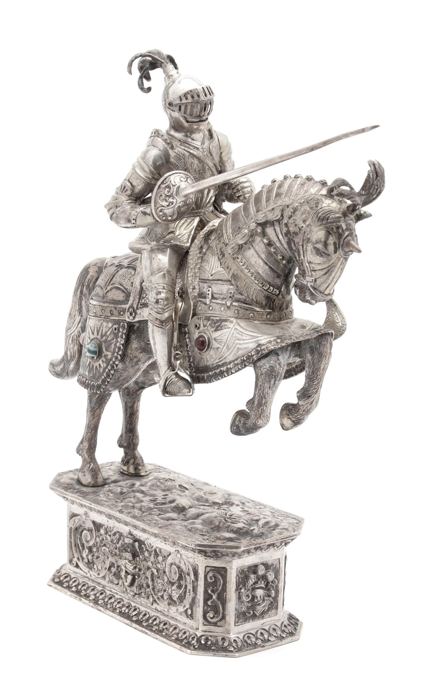 A German Hanau Silver Knight Mounted on Horseback, 19TH CENTURY, the horse armor mounted with agate cabochons.