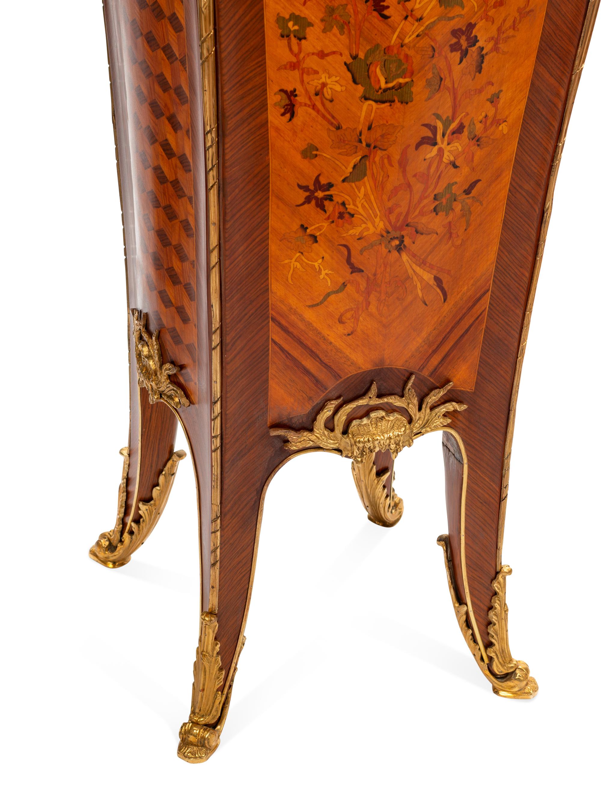 A Pair of Louis XV Style Gilt Metal Mounted Marquetry Pedestals