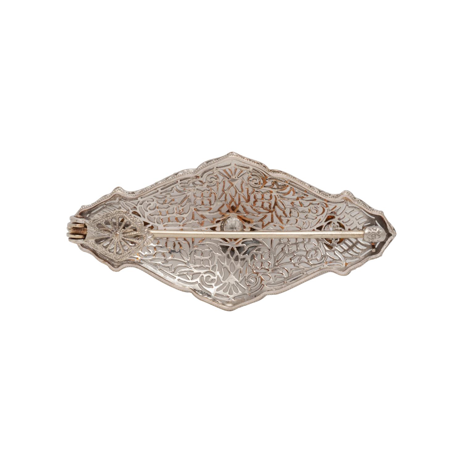 PLATINUM AND DIAMOND PENDANT/BROOCH