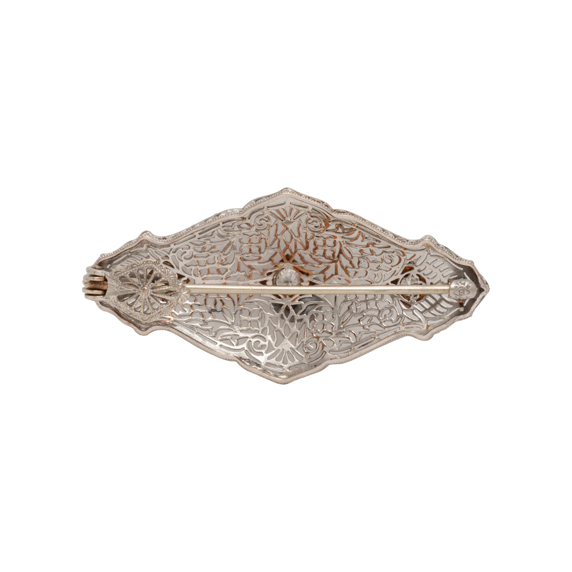 PLATINUM AND DIAMOND PENDANT/BROOCH