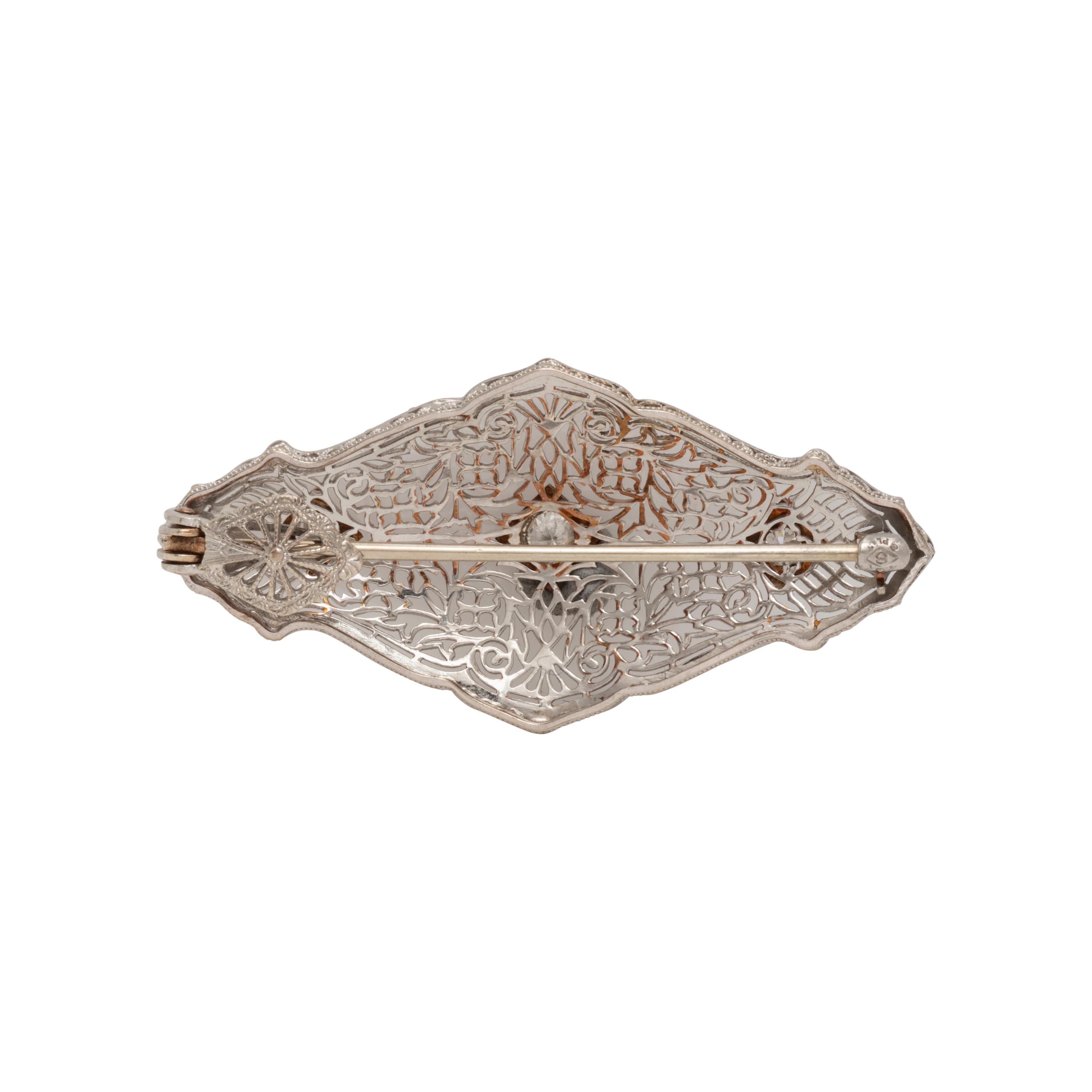 PLATINUM AND DIAMOND PENDANT/BROOCH