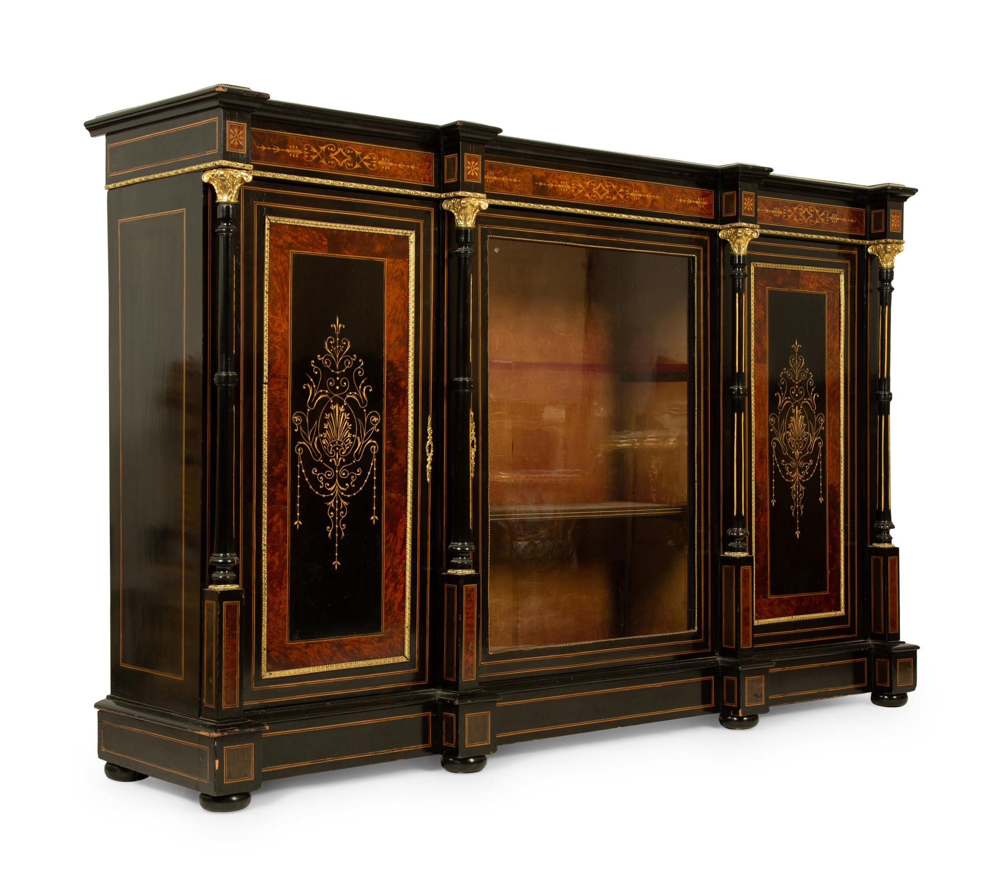 A Napoleon III Gilt Bronze Mounted Marquetry, Burlwood and Ebonized Wood Breakfront Cabinet — CIRCA 1870
