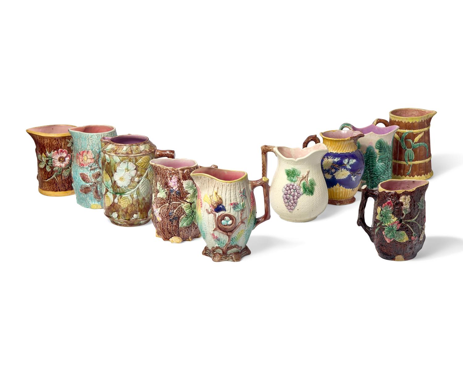 A Collection of Ten Large Majolica Pitchers