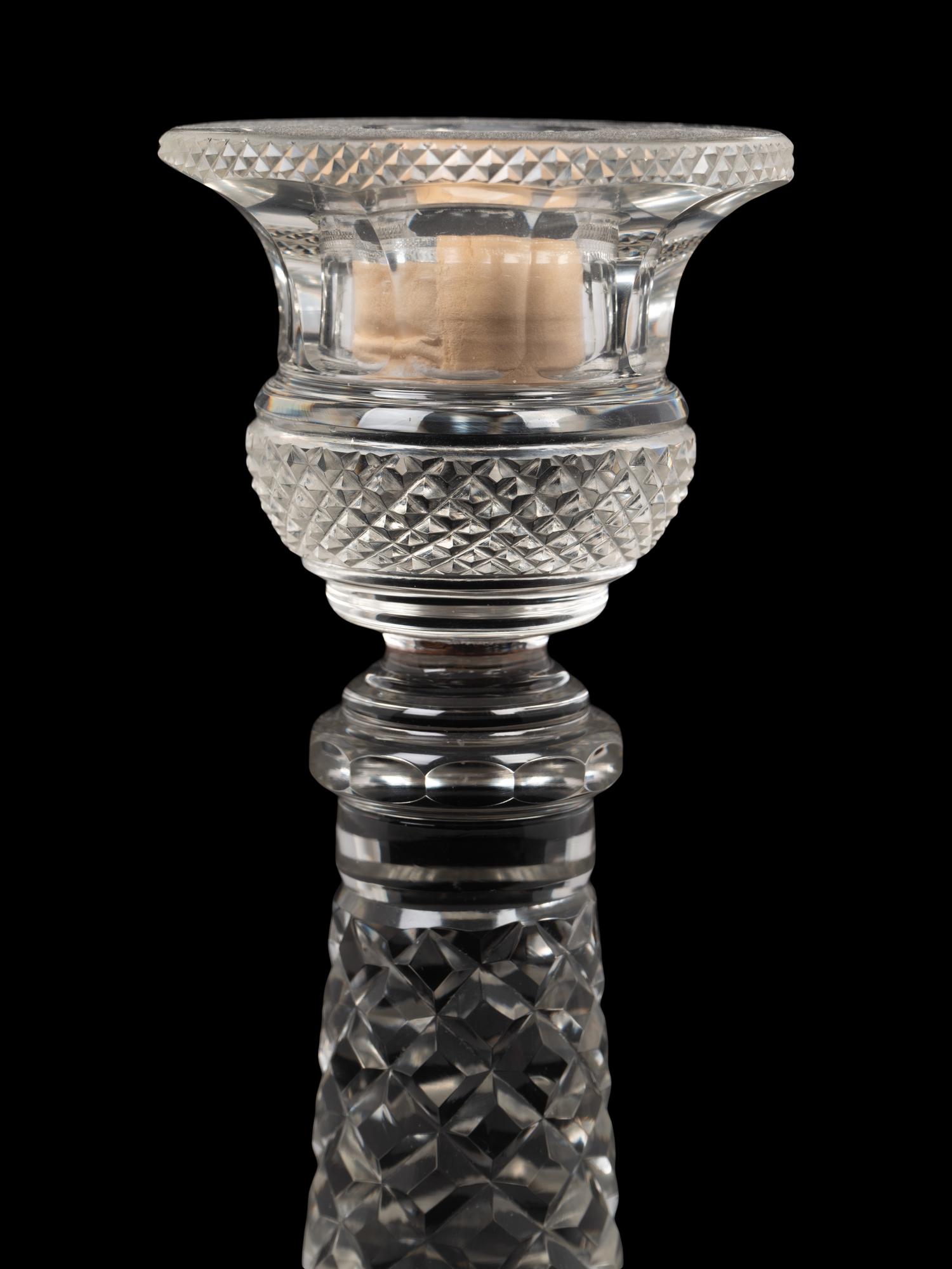APPROVED FOR DONATION A Pair of Cut Glass Candlesticks