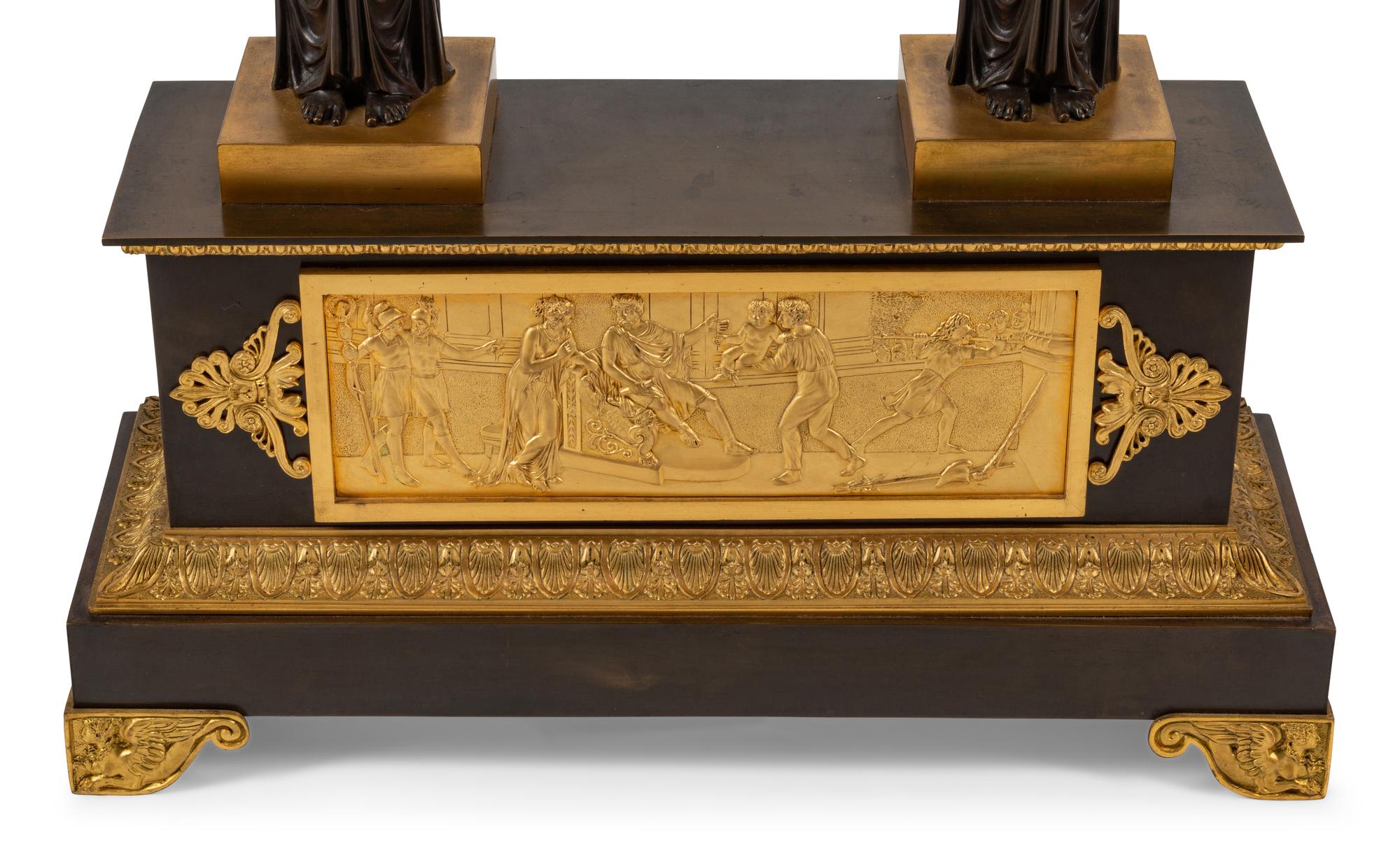 A Large Empire Style Gilt and Patinated Bronze Clock Garniture