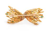 LA TRIOMPHE, YELLOW GOLD, DIAMOND AND EMERALD BROOCH