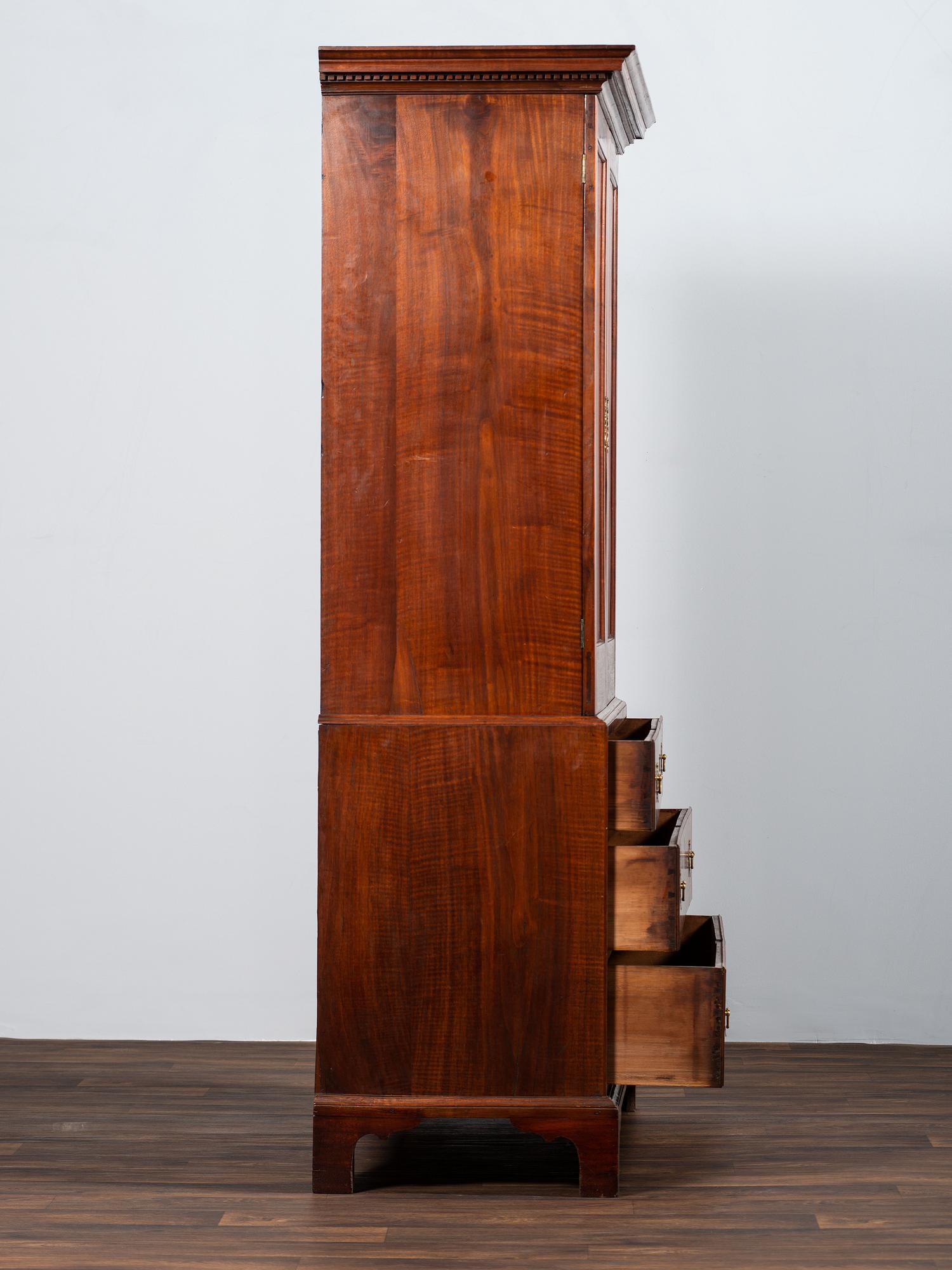 A Chippendale Figured Mahogany Linen Press