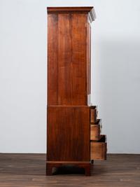 A Chippendale Figured Mahogany Linen Press