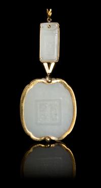 Two Chinese 14 Karat Gold Mounted White Jade Plaques 18TH/19TH CENTURY Large plaque 2 1/4 inches, small plaque 1 1/4 inches. — 18TH/19TH CENTURY