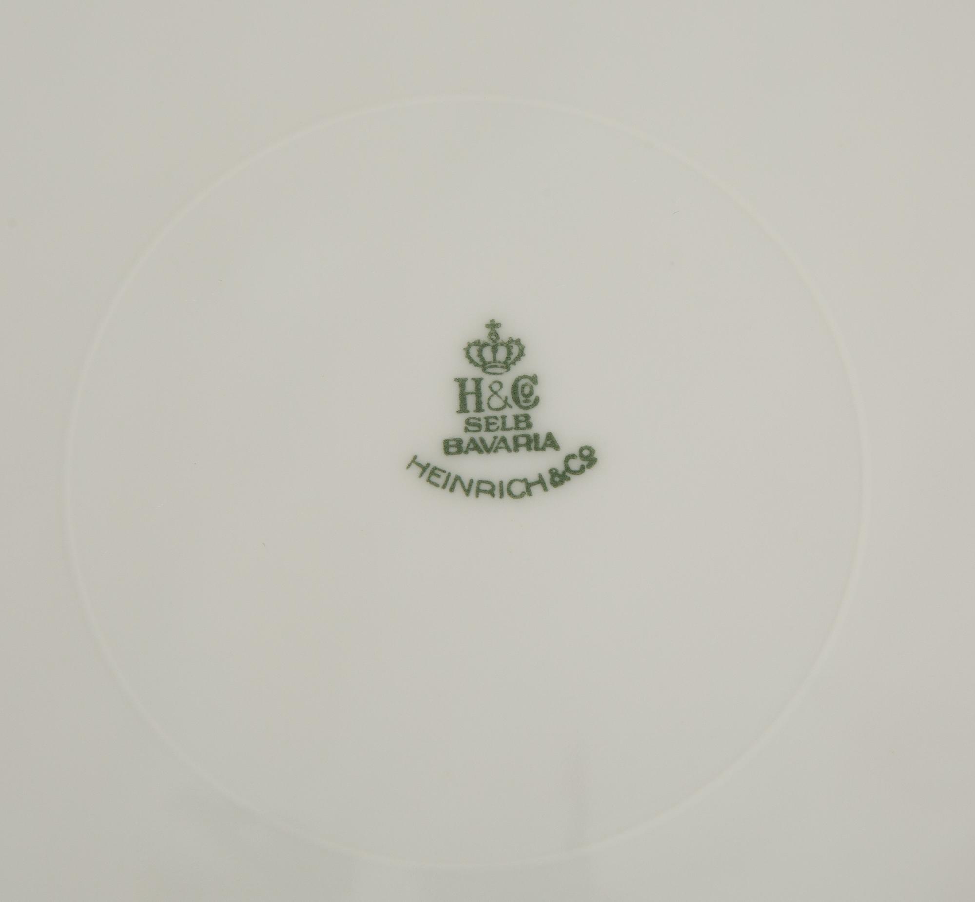 A Set of Twelve German Porcelain Service Plates