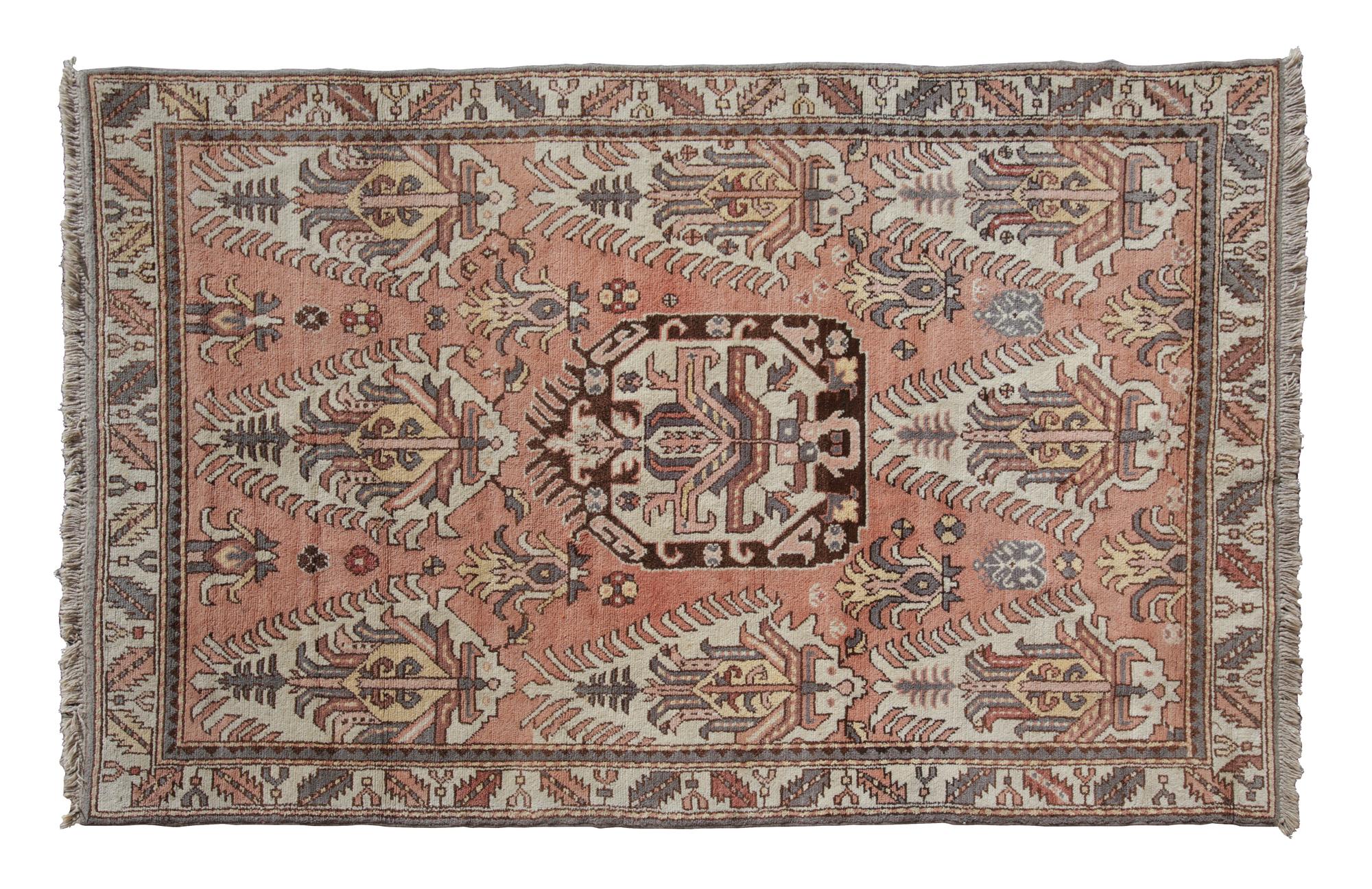 A Caucasian Style Wool Rug 7 feet 10 inches x 5 feet 3 inches.
