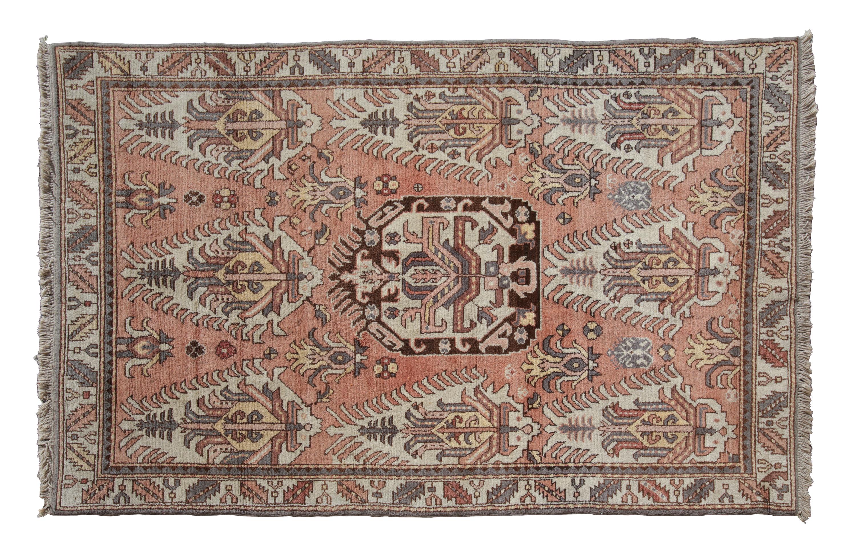 A Caucasian Style Wool Rug 7 feet 10 inches x 5 feet 3 inches.