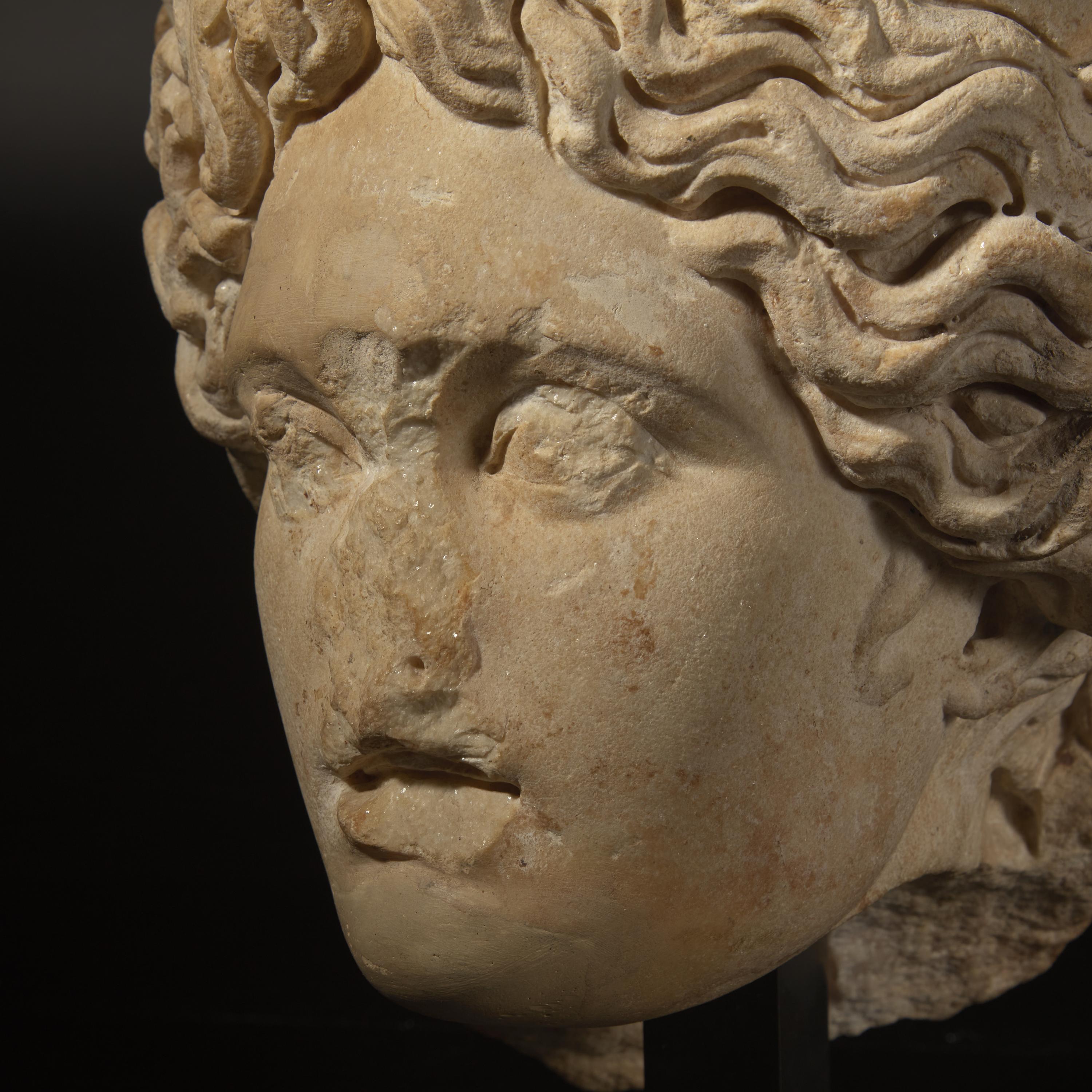 A Roman Marble Head of Apollo Citharoedus