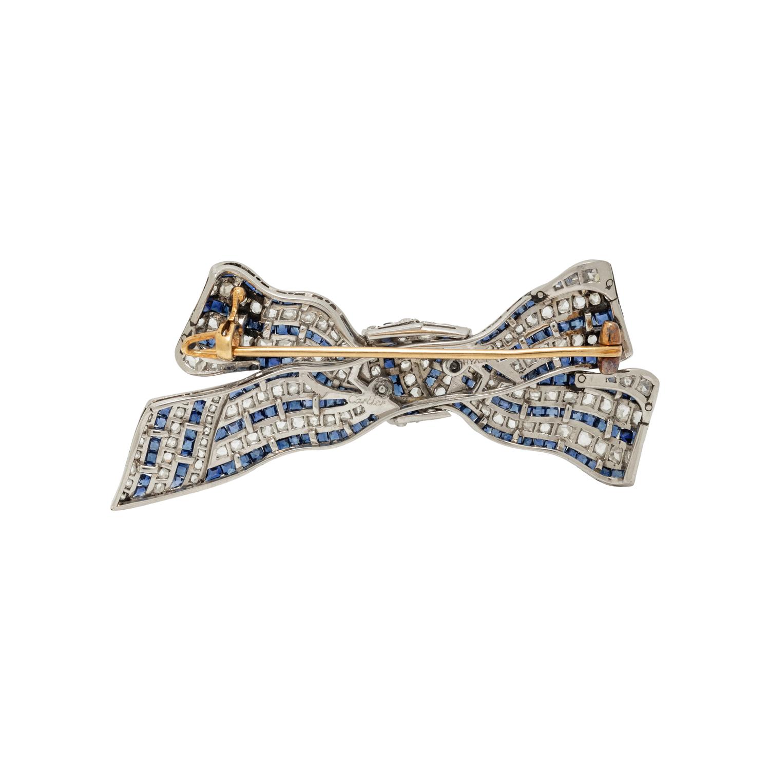 CARTIER, SAPPHIRE AND DIAMOND BOW BROOCH