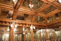 A Mirror inset and Bird's Eye Maple Nashville Jewelry Store Interior 255" W x 223" D x 120.5" — United States, Circa 1913