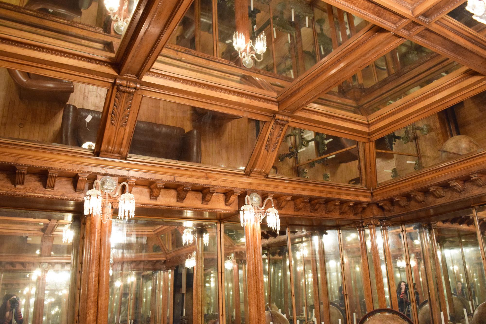 A Mirror inset and Bird's Eye Maple Nashville Jewelry Store Interior 255" W x 223" D x 120.5" — United States, Circa 1913