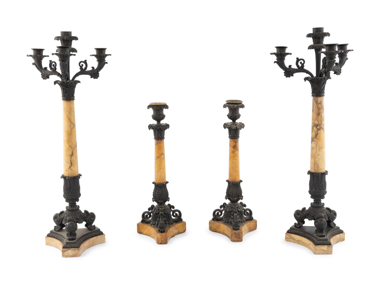 An Assembled French Marble and Bronze Five-Piece Clock Garniture