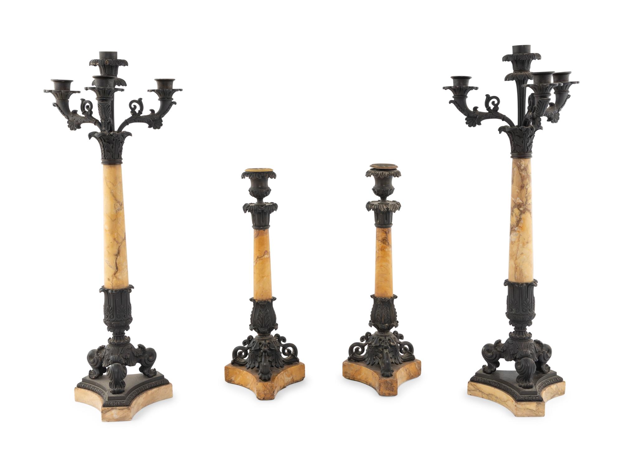 An Assembled French Marble and Bronze Five-Piece Clock Garniture