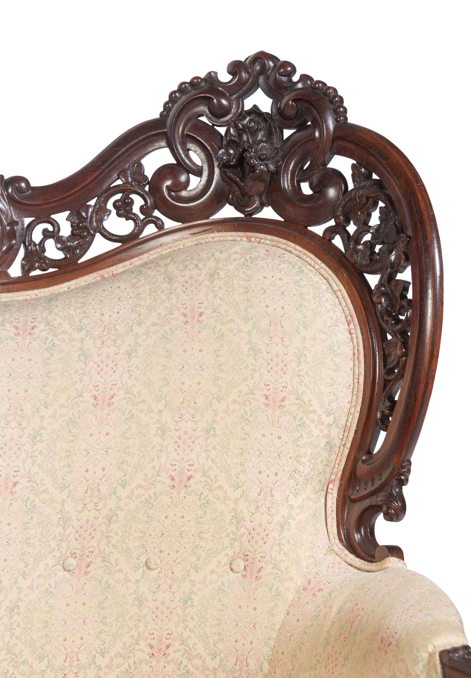 A Joseph Meeks and Sons Carved Rosewood Sofa