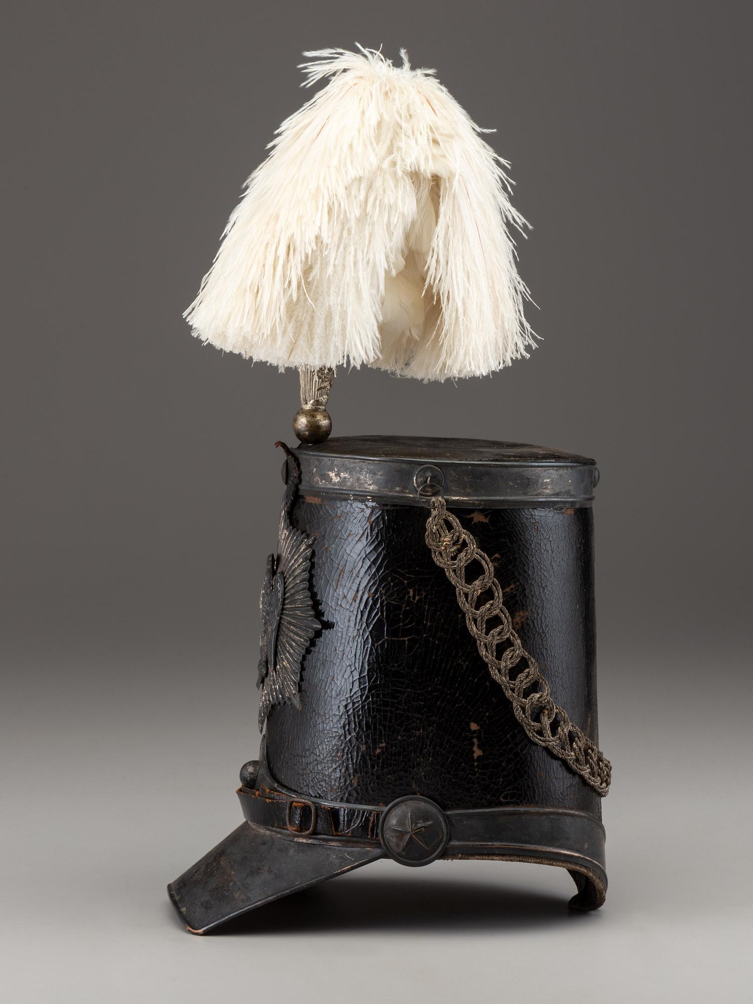 [MILITIA]. Fully-trimmed militia dragoon shako with original box. Manufactured by Joseph T. Bell, New York, ca 1840.