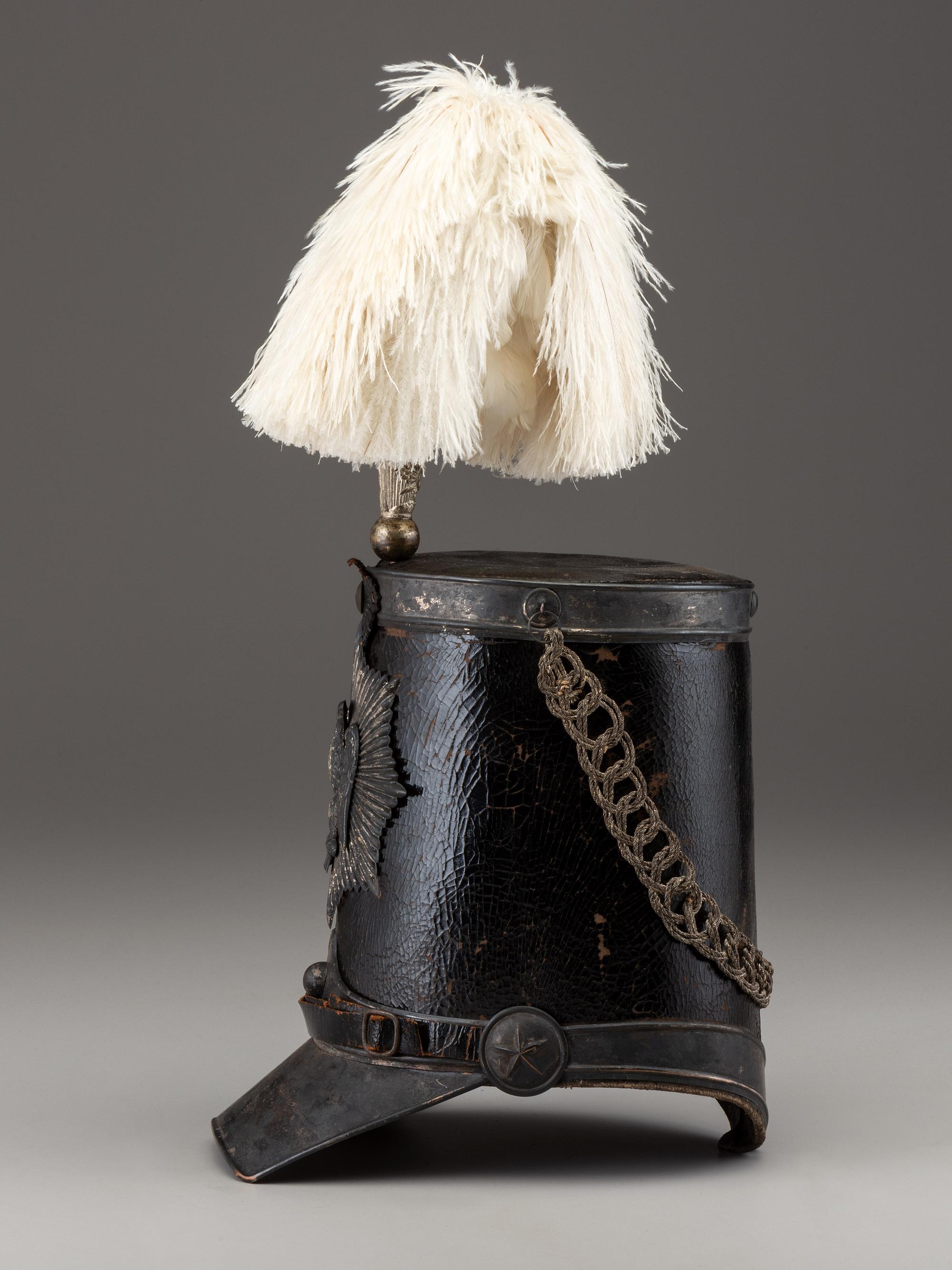 [MILITIA]. Fully-trimmed militia dragoon shako with original box. Manufactured by Joseph T. Bell, New York, ca 1840.
