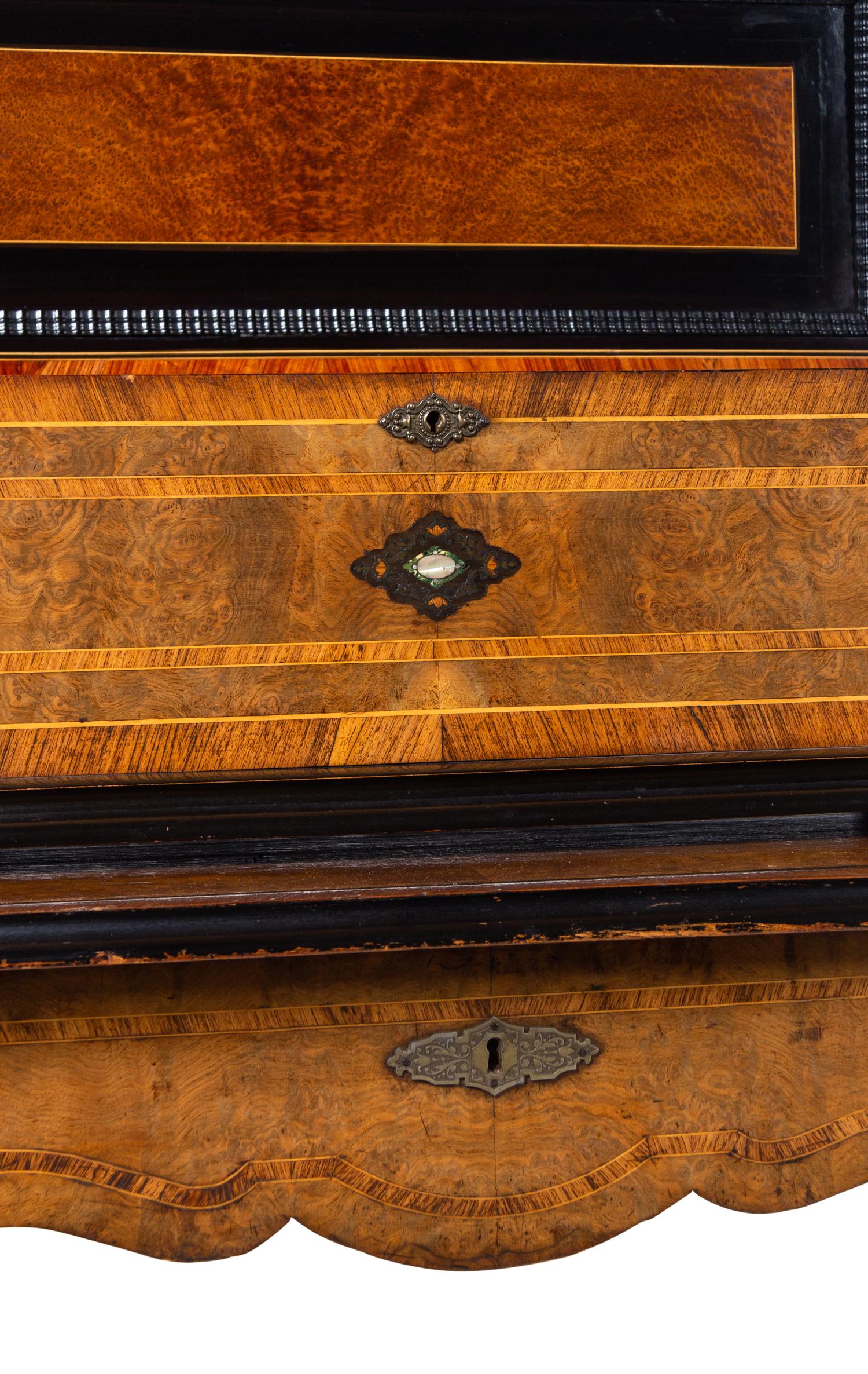 A Swiss Parcel Ebonized and Mother-of-Pearl Inlaid Burlwood Music Box on Stand