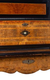 A Swiss Parcel Ebonized and Mother-of-Pearl Inlaid Burlwood Music Box on Stand