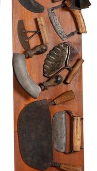 A Collection of Wrought Iron Kitchen Tools Mounted to Panel