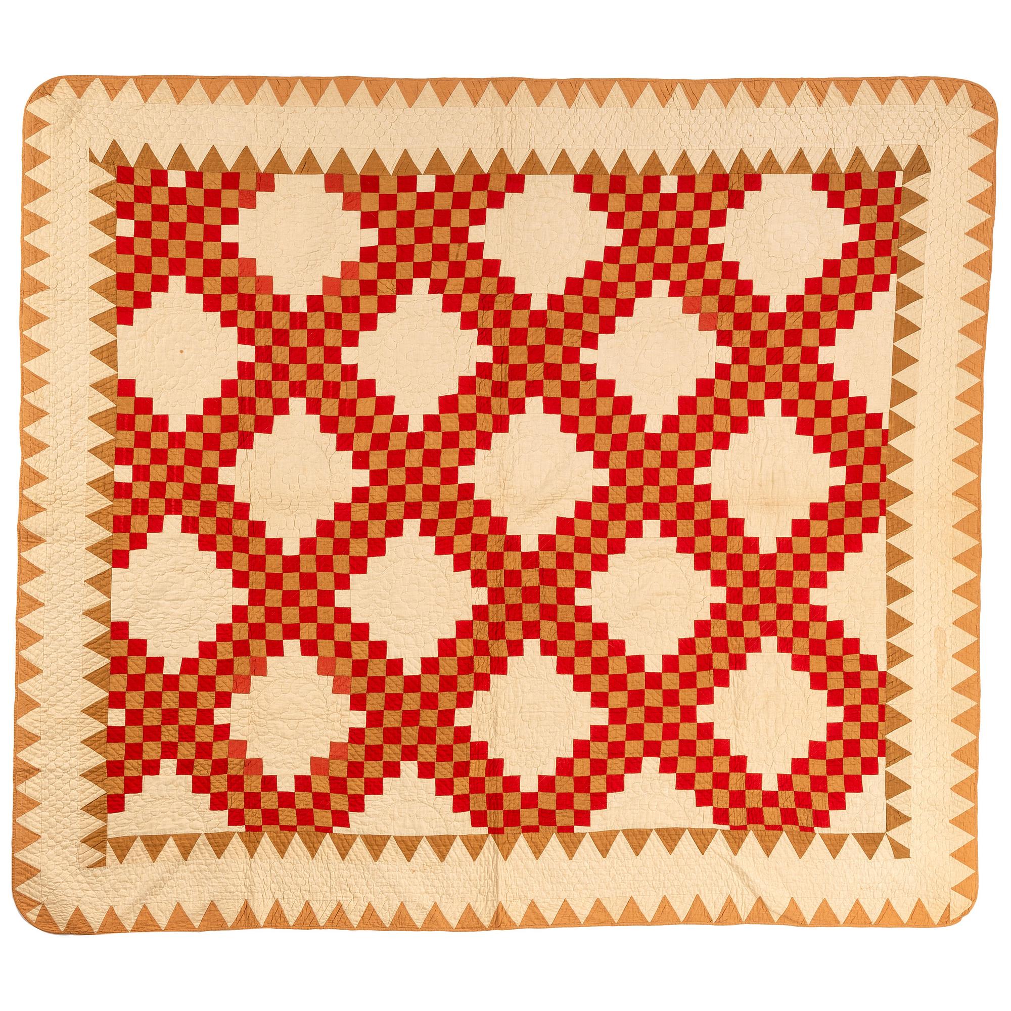 A Diamond Cross Pattern Quilt in Red and Brown
