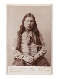 [NATIVE AMERICANS]. Cabinet card of a Sioux Brave taken prisoner at Pine Ridge and brought to Fort Sheridan. Chicago, IL: George Spencer, ca 1883.