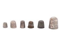 Six Silver and Mixed Metal Thimbles